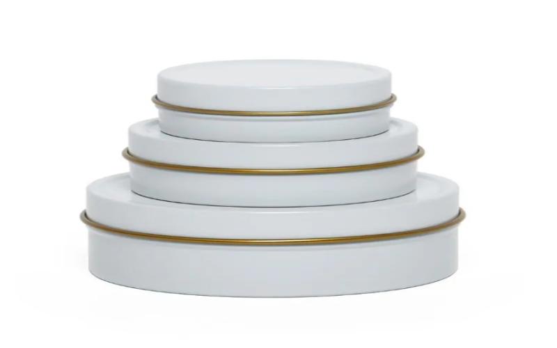 White tin cans of different sizes(1)