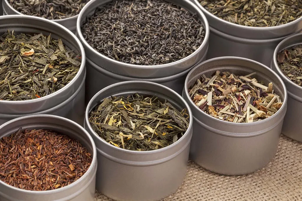 How do stackable tea tins protect loose-leaf tea
