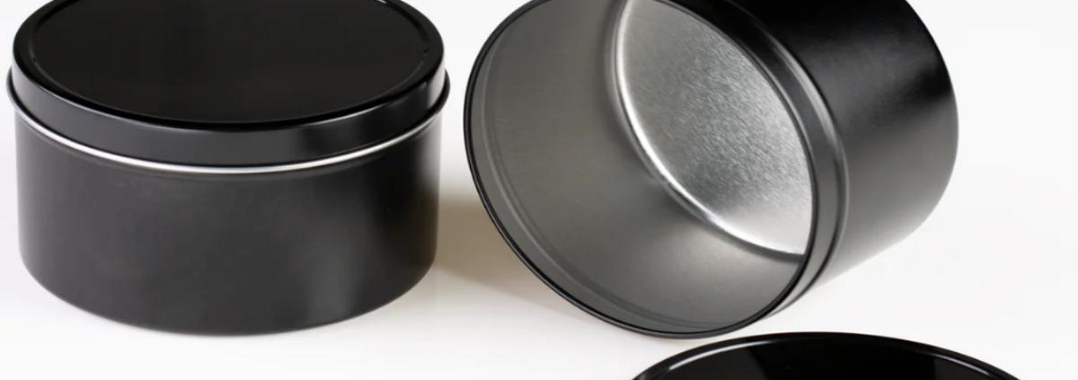 Glossy black tins