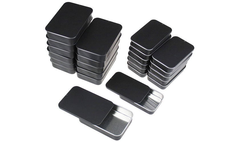 How do the shape and size of personalized black tins affect functionality
