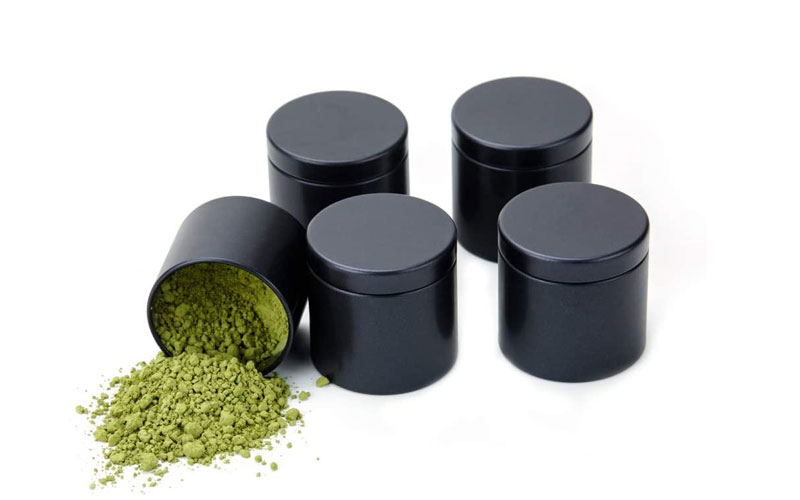 How do the shape and size of personalized black tins affect functionality